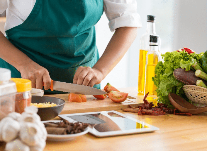 Woman chopping veggies